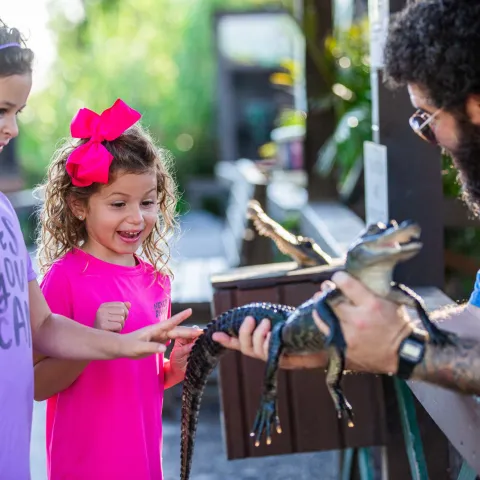 a man holding a child