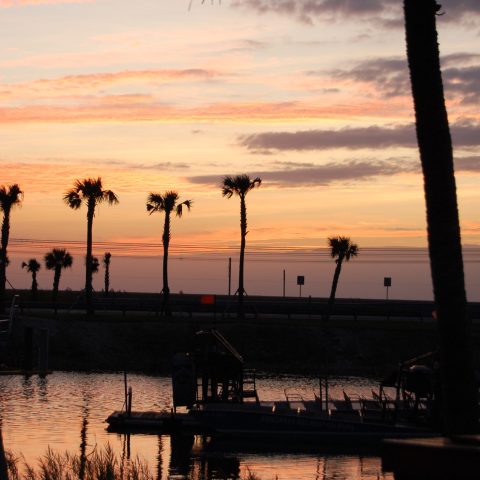a sunset over a body of water
