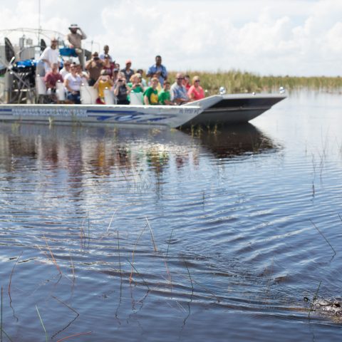 a small boat in a body of water