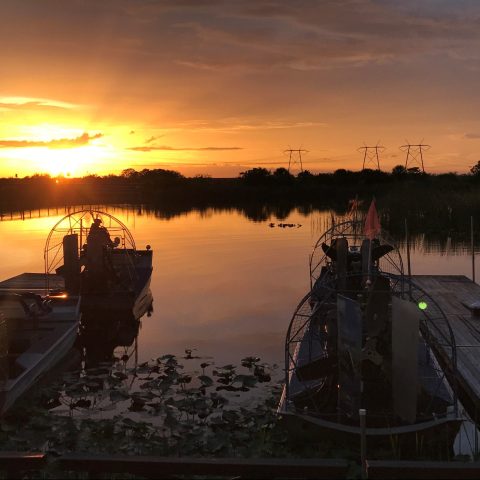 a sunset over a body of water